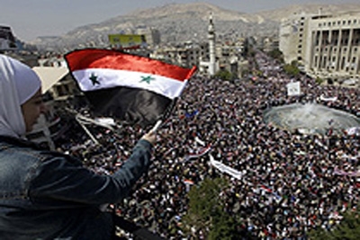 Manifestantes vão às ruas da Síria apoiar o governo