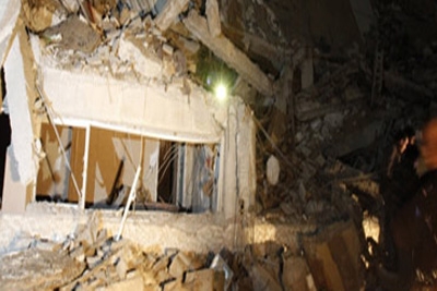 Coalizão derruba edifício Khadafi em Trípoli